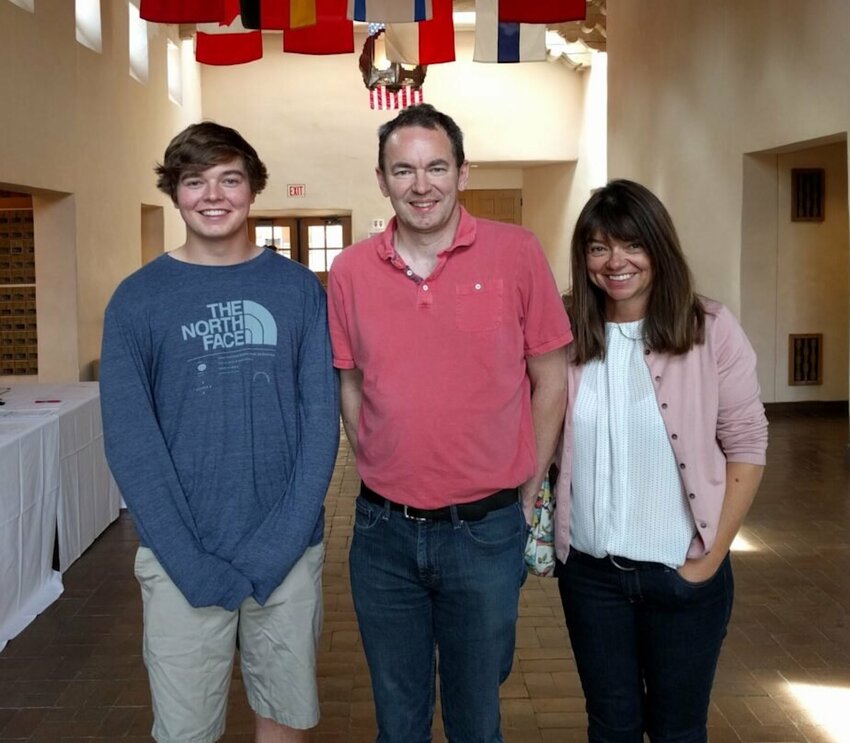 Christian Glass with his parents Simon and Sally Glass.